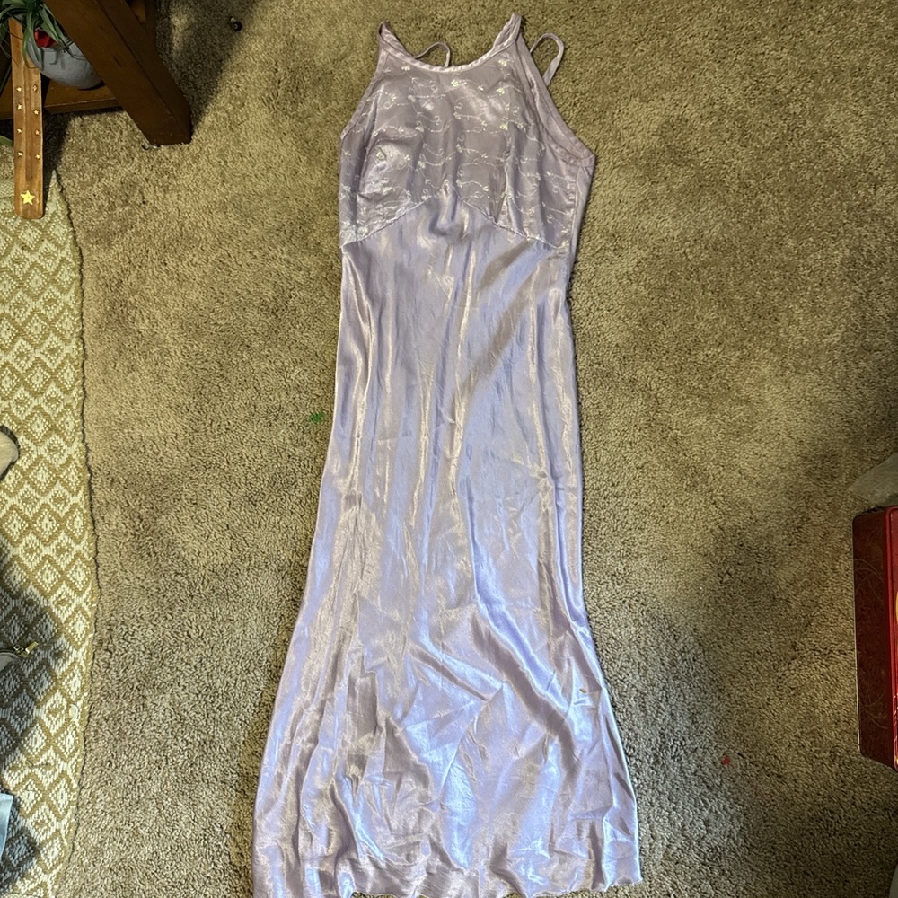 Medium , women’s silk dress with embroidery at the top.